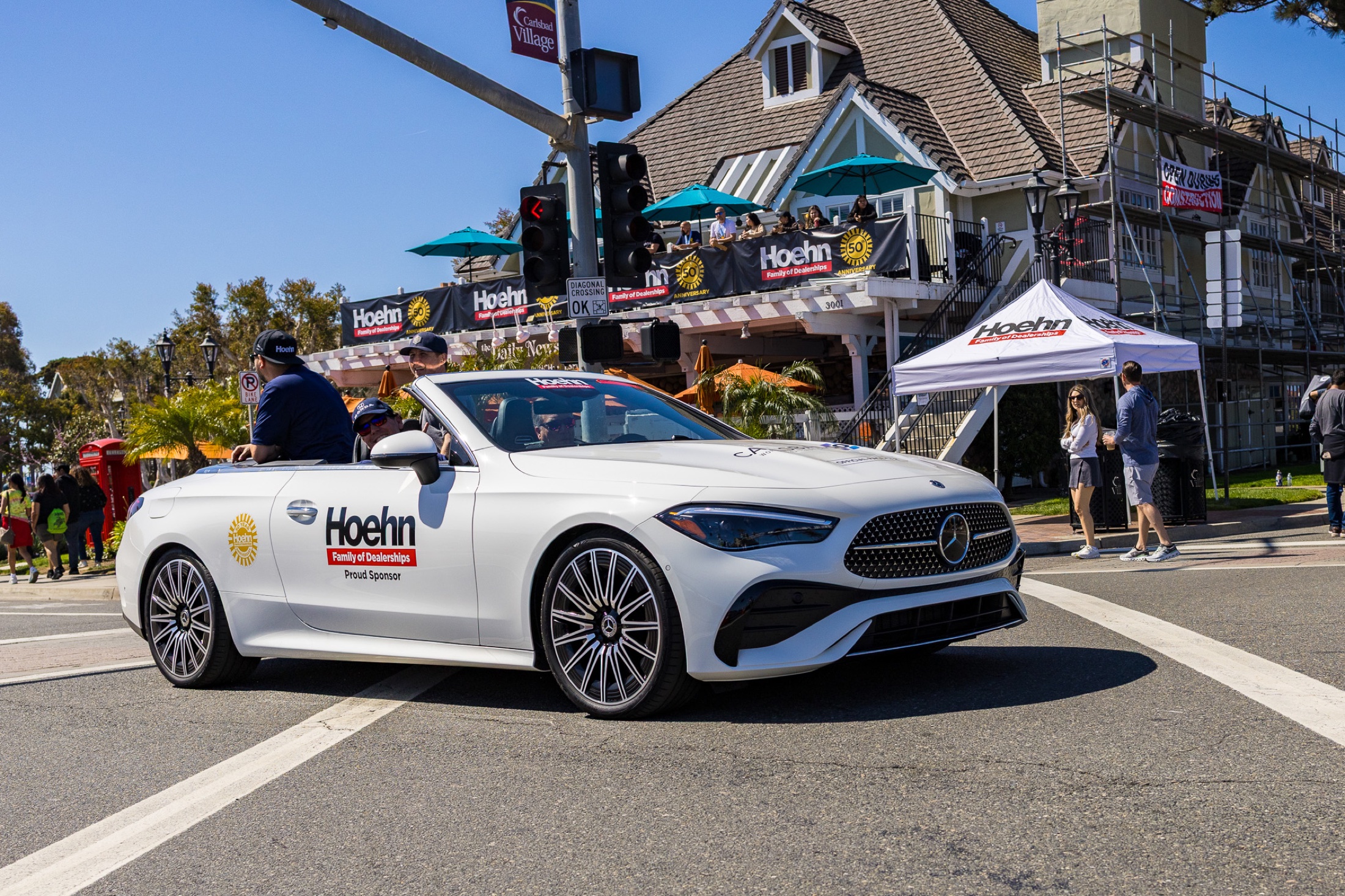 Hoehn-branded pace car and tent at the Carlsbad 5000 road race in Carlsbad Village