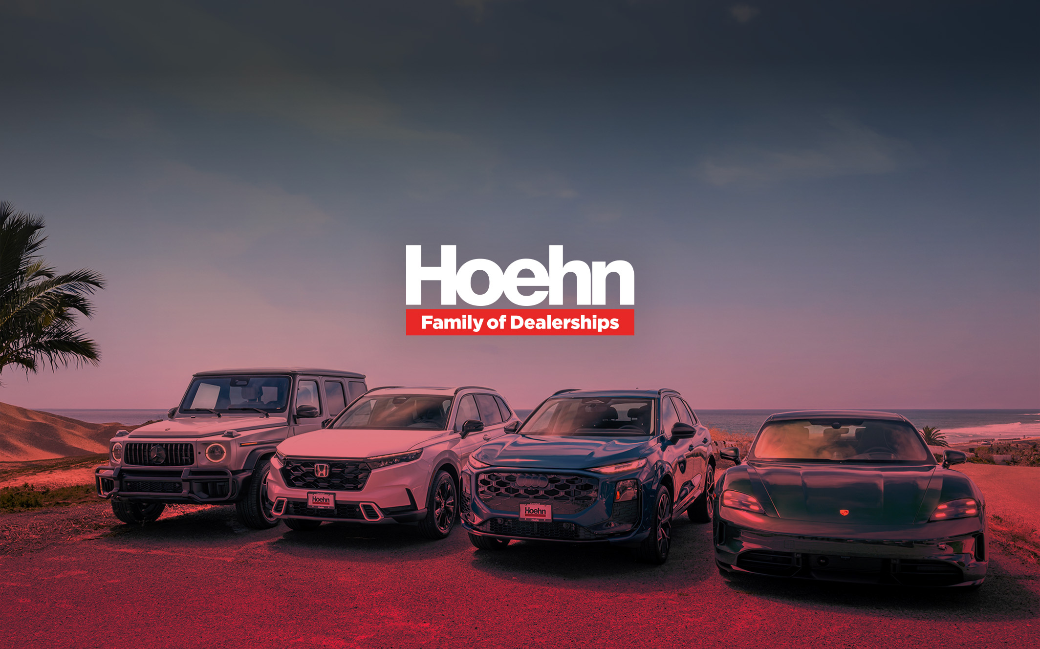 Hoehn Family of Dealerships cover: a Mercedes-Benz G-Class, Honda CR-V, Land Rover, and Porsche Taycan lined up above the coast at sunset