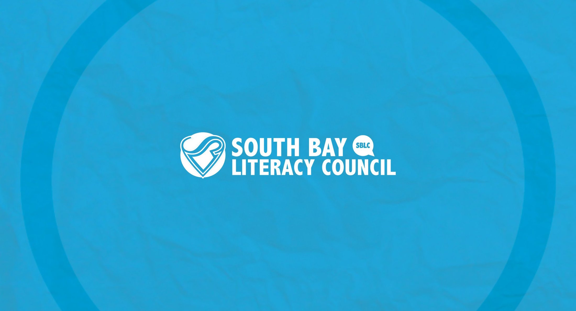 South Bay Literacy Council cover: the SBLC logo on bright blue textured paper